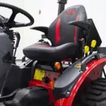 Mahindra MAX 26 XLT HST tractor operator chair area.