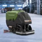 Kodiak K16 floor scrubber with disk deck in warehouse.