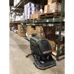 Kodiak K16 disk professional scrubber in warehouse facility.