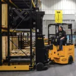 Bendi B40AC-DR electric forklift placing pallet on racking.