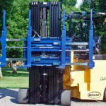 Bendi B55AC forklift with special attachment.
