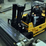 Drexel R60i5 LPG forklift transporting materials in workshop.