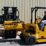 Drexel SL120 electric forklift truck with swing mast.