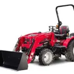 Mahindra 2100 Series Compact Tractor with bucket loader attachment.