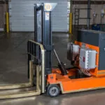 RICO EX Walk Behind Counterbalance Lift Truck in warehouse. .