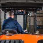 Operator driving RICO IC Pegasus forklift.