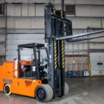 RICO IC Pegasus forklift with mast raised.