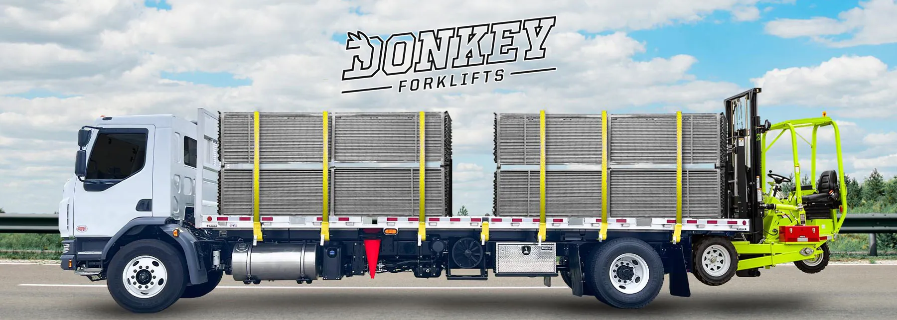 Donkey forklift mounted on the back of a truck.