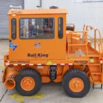 Rail King G7 Railcar mover in parking lot.