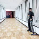 Dryft micro scrubber cleaning hallway floors.