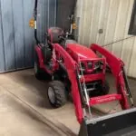 Mahindra 1123 compact tractor with loader.