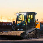 JCB 250T Compact Track Loader with bucket full of dirt.