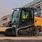 JCB 250T Compact Track Loader with bucket attachment on construction job site.