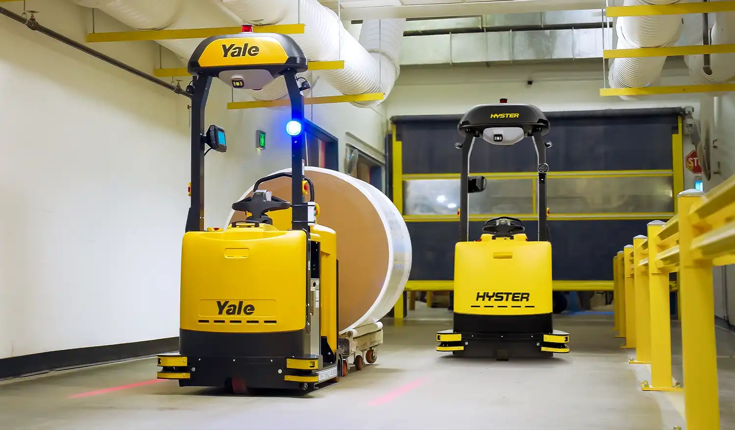 Hyster Atlas and Yale Relay in a warehouse.