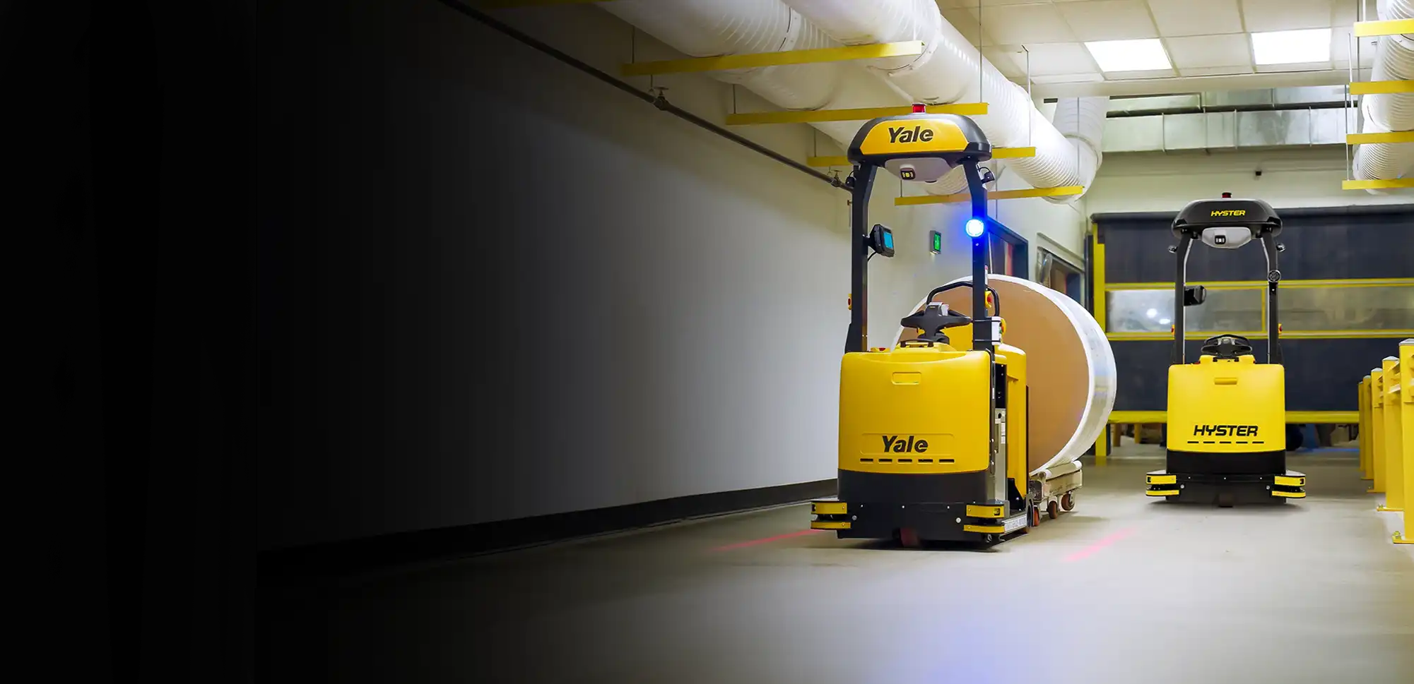 Hyster Atlas and Yale Relay in a warehouse.
