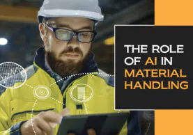 Warehouse worker analyzing data points. "The role of AI in Material Handling".